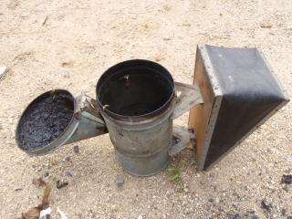 フタを開けたくん煙器